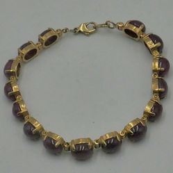 14KT YELLOW GOLD BRACELET 7 INCHES LONG 18.1 GRAMS W PURPLE CABOCHON STONES MINT CONDITIO