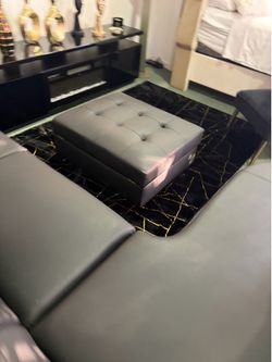 BLACK LEATHER OTTOMAN