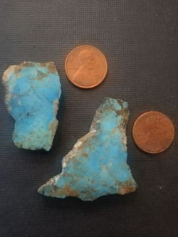 2 pieces of solid turqouise rock plus more gems