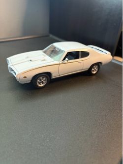 Classic 1969 Pontiac GTO "The Judge" diecast model in white!