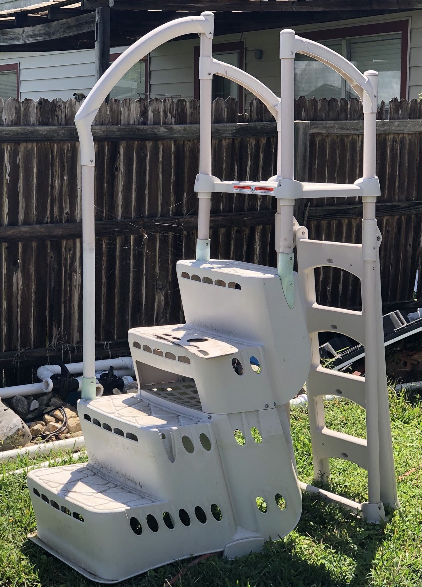 24’ x 52” steel wall with stainless service panel above ground pool for