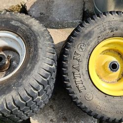 Tractor front tires.. They do not hold air... Make offer..