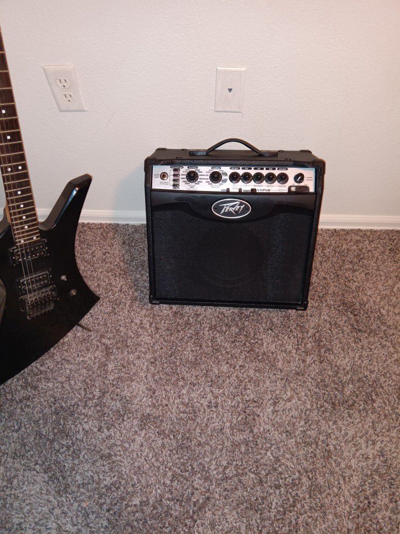 Electric  Guitar, Acoustic  Guitar And Bass  Guitar Amplifier .