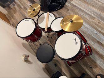 Used Mendini drum set for child
