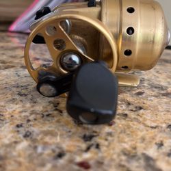 Vintage Daiwa Mini cast Gold Spin cast Reel for Sale in Milford