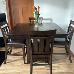 Table And 4 Chairs With Storage