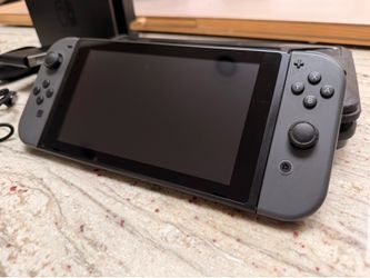 Nintendo Switch console w/ gray Joy-Cons, dock, accessories + case