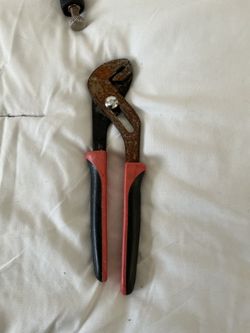 a pair of tongue-and-groove pliers or Lock pliers (or adjustable water-pump pliers).