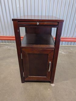 Versatile Dark Wood Nightstand with Pull-Out Extensions