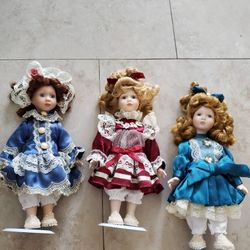 11 Different Small Porcelain Dolls On Stands $5 Each
