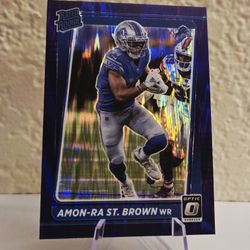 Amon-Ra St. Brown#228 Purple Shock Prizm  2021 Donruss Optic Rated Rookie Lions