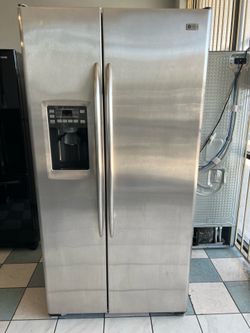 Ge side by side stainless steel refrigerator ( delivery Available)