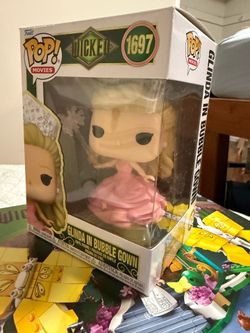 Wicked memorabilia, alphabet Glenda Lego, and pop funko