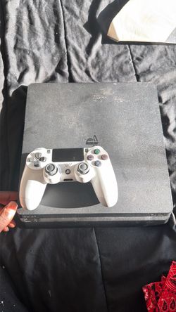 PlayStation 4 Slim Console with Controller