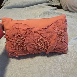 Threshold decorative lumbar pillow from Target in a warm burnt orange / terracotta tone.