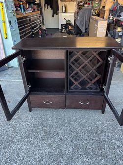 Liquor bottle cabinet, good solid wood