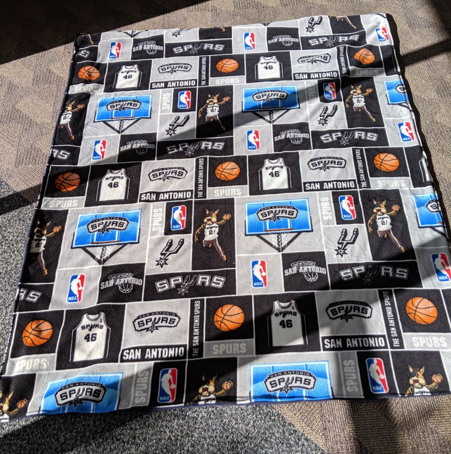 Large. San Antonio Spurs blanket. 56' x 68'. Hand assembled.