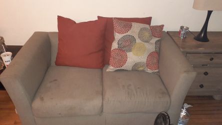 Chair love seat more pillows in better shape than looks good deal