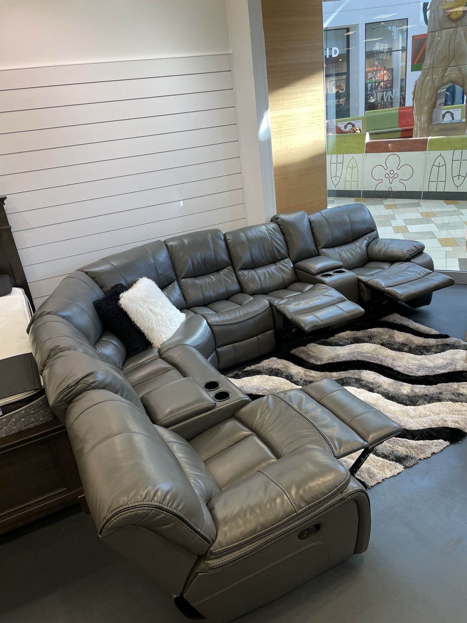Going out of business sale. Madrid gray leather reclining sectional now $1599. Easy finance option. Same day delivery.