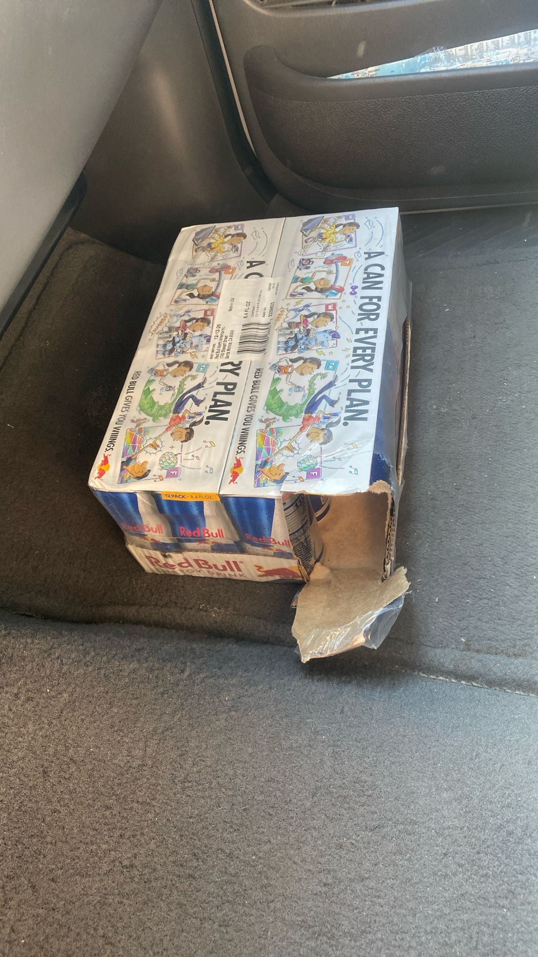 Red Bull Cans 1 Full Box And 10 In The Other Box 
