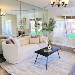 Black wood coffee table with metal legs