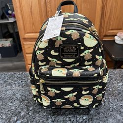 Disney Loungefly Mini Backpack Star Wars Baby Yoda.  Brand new with tags.  Smoke free home 