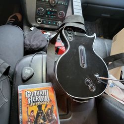 Playstation 3 guitar hero guitar with dongle and guitar hero 3 legends of rock game 
Great Condition