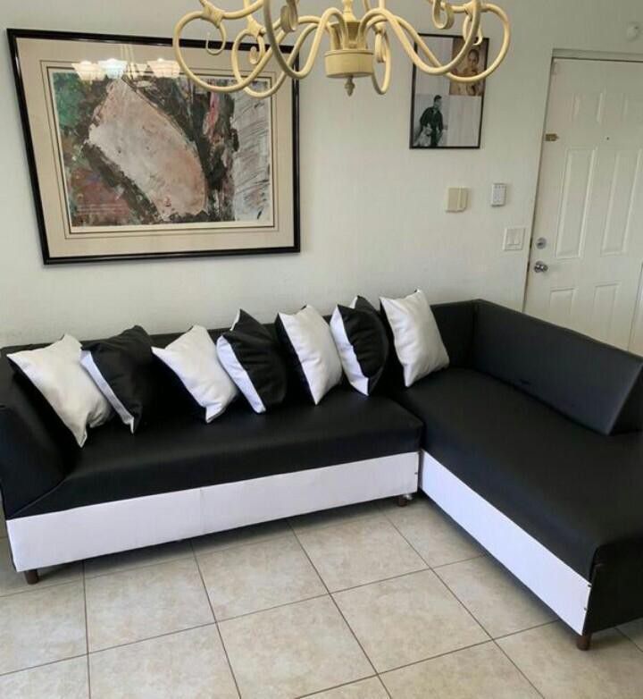 Sectional White and Black with pillow. New