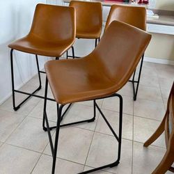 Bar Stools New in Original Packagings Set of 4 Whiskey Brown Leather Retailed For $640.00.