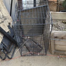 Black dog cage