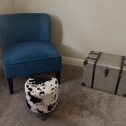 Teal chair and cow print foot stool