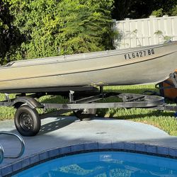 Aluminum boat 14 Foot 9 Johnson Outboard Engine 