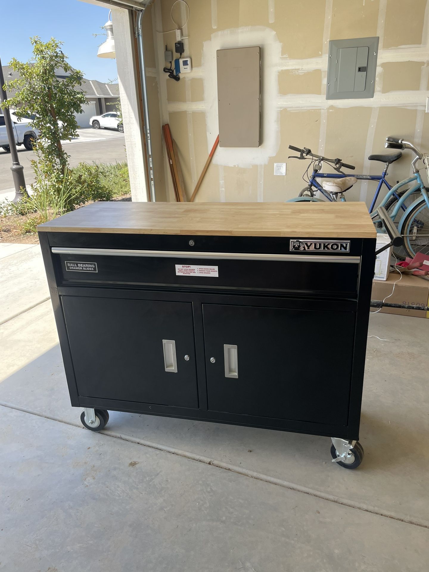 Yukon 46 in. Mobile Workbench with Solid Wood Top, Black