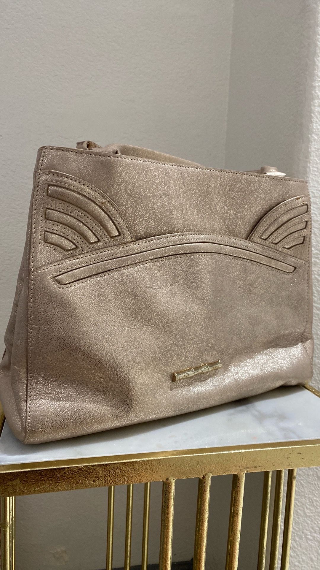 metallic gold Elaine Turner leather shoulder tote bag.