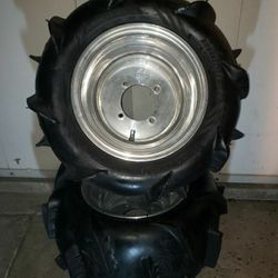 Sand Gear paddle tires with SS rims. 