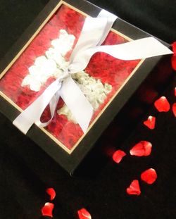 “J” mini rose box arrangement