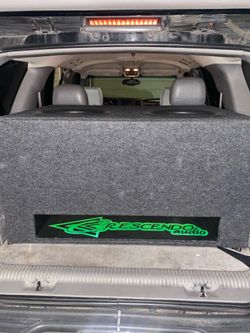 Two 18 inch crescendo subwoofers in a custom box  🔊 with two Amps …