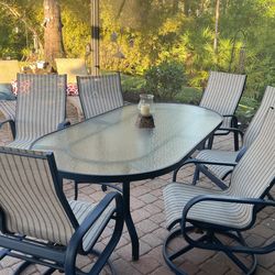 Patio table with  6 Chairs  , and 1  extra Food Rest