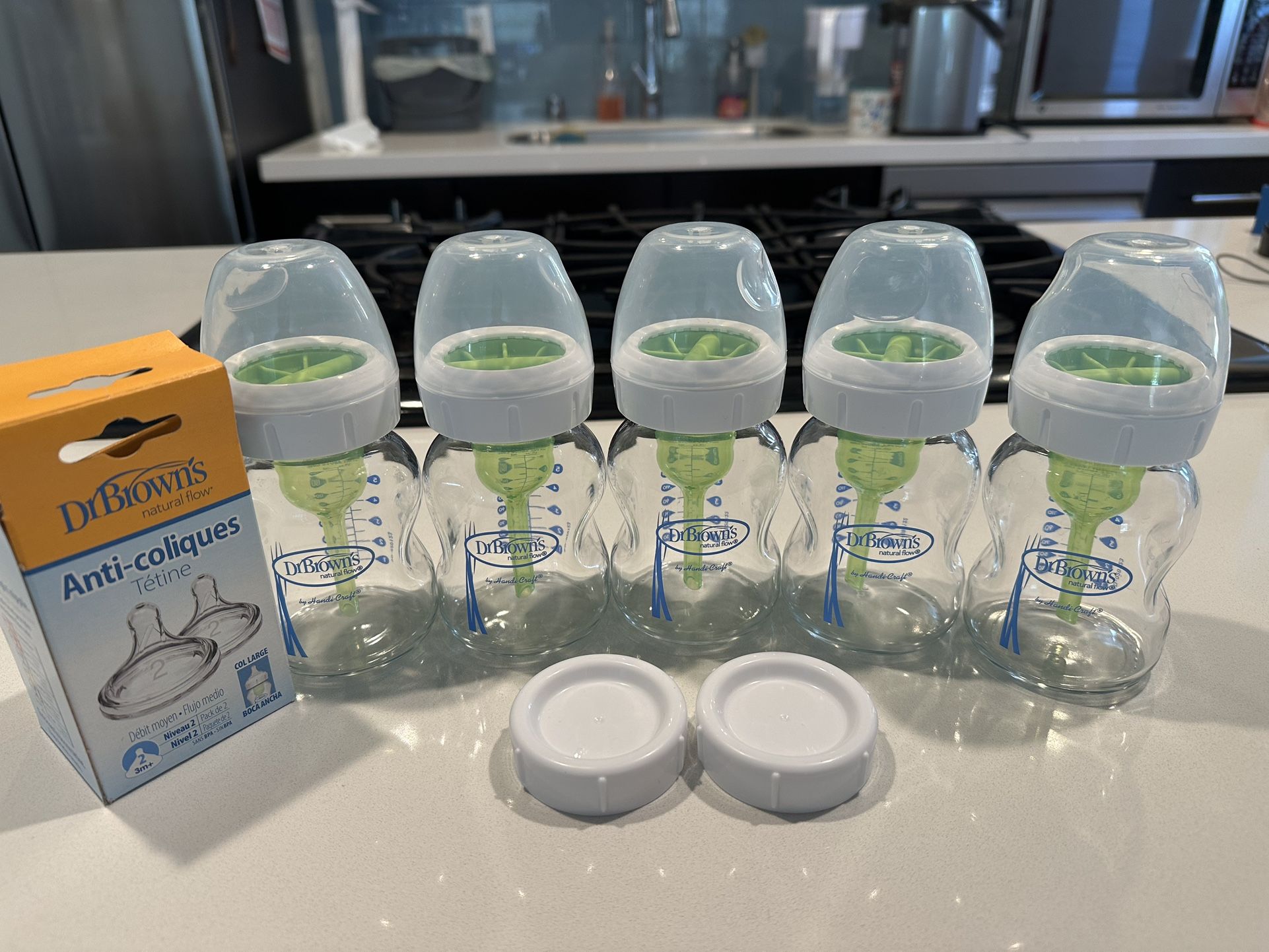Dr. Brown glass 5 oz bottles (5 total) and level 2 nipples