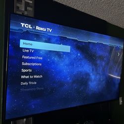 65” TLC Roku TV w/ Wall Mount and remote