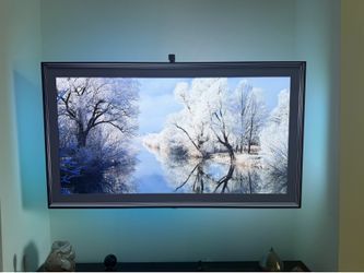 LG C1 65” OLED with soundbar and backlight