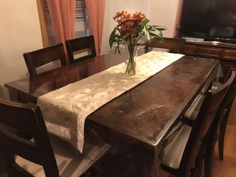 Multiple items for sale table chairs bench wine cart there is also a 40 inch tv
