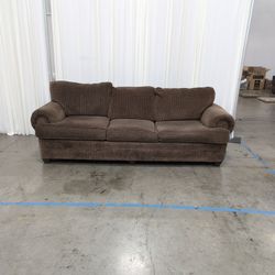 Brown Rolled Arm Three-Cushion Couch in Textured Fabric