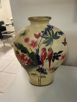 Gorgeous decorative large vase with floral and bird motif. The style is from possibly drawings from Asian and European with presence of hand-painted d