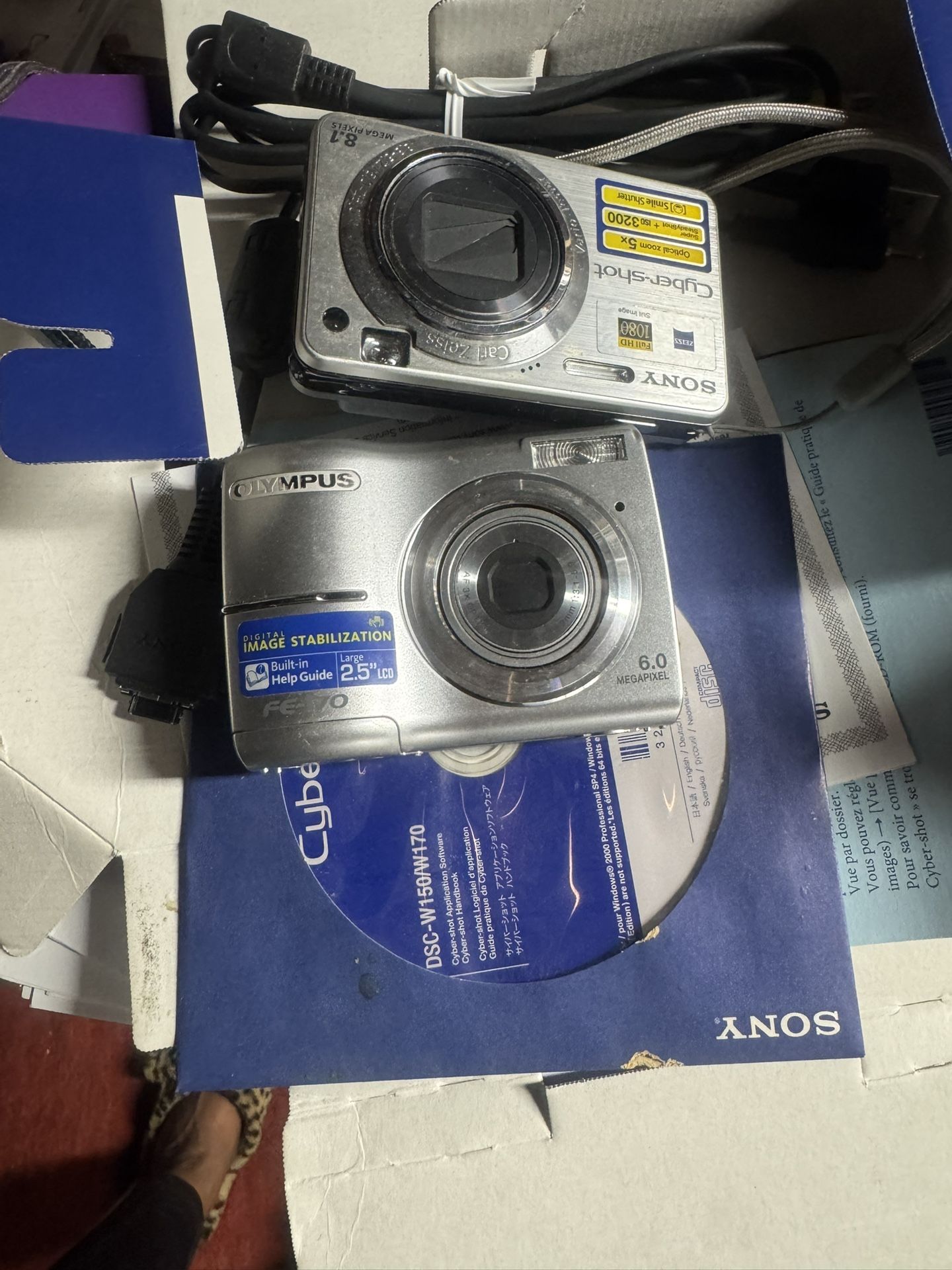 Sony Cyber Shot 8.1 And Olympus 6.1