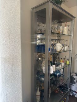 Credencia con espejo , juguetería de espejo