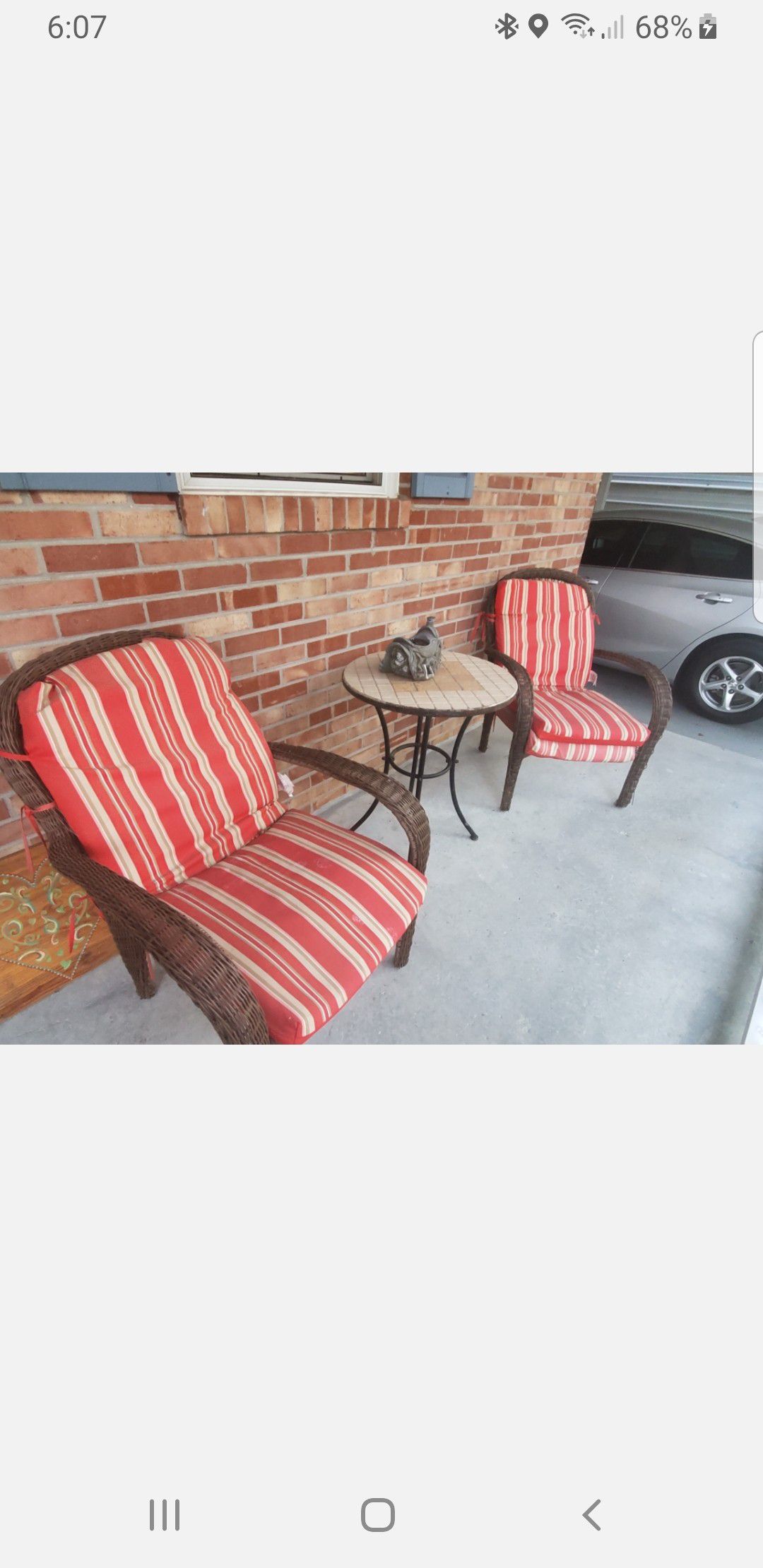 Outside patio bistro set with wicker chairs