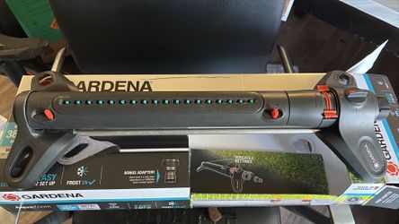 ASPERSOR OSCILANTE AJUSTABLE GARDENA AQUAZOOM (3800 sq ft) – ¡COMO NUEVO EN CAJA!