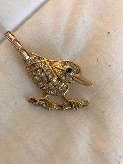 Broche en forma de pajarito