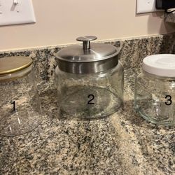 Three Glass Storage Jars